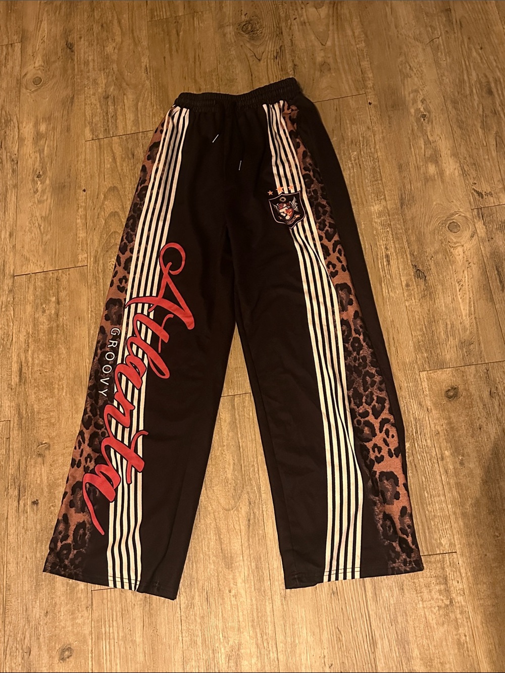 Groovy Black Leopard-Trim Sweatpants with Red Script